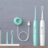 toothbrush and scaler_0008_da905957-6400-4257-96b4-ae026f119204_0.jpg